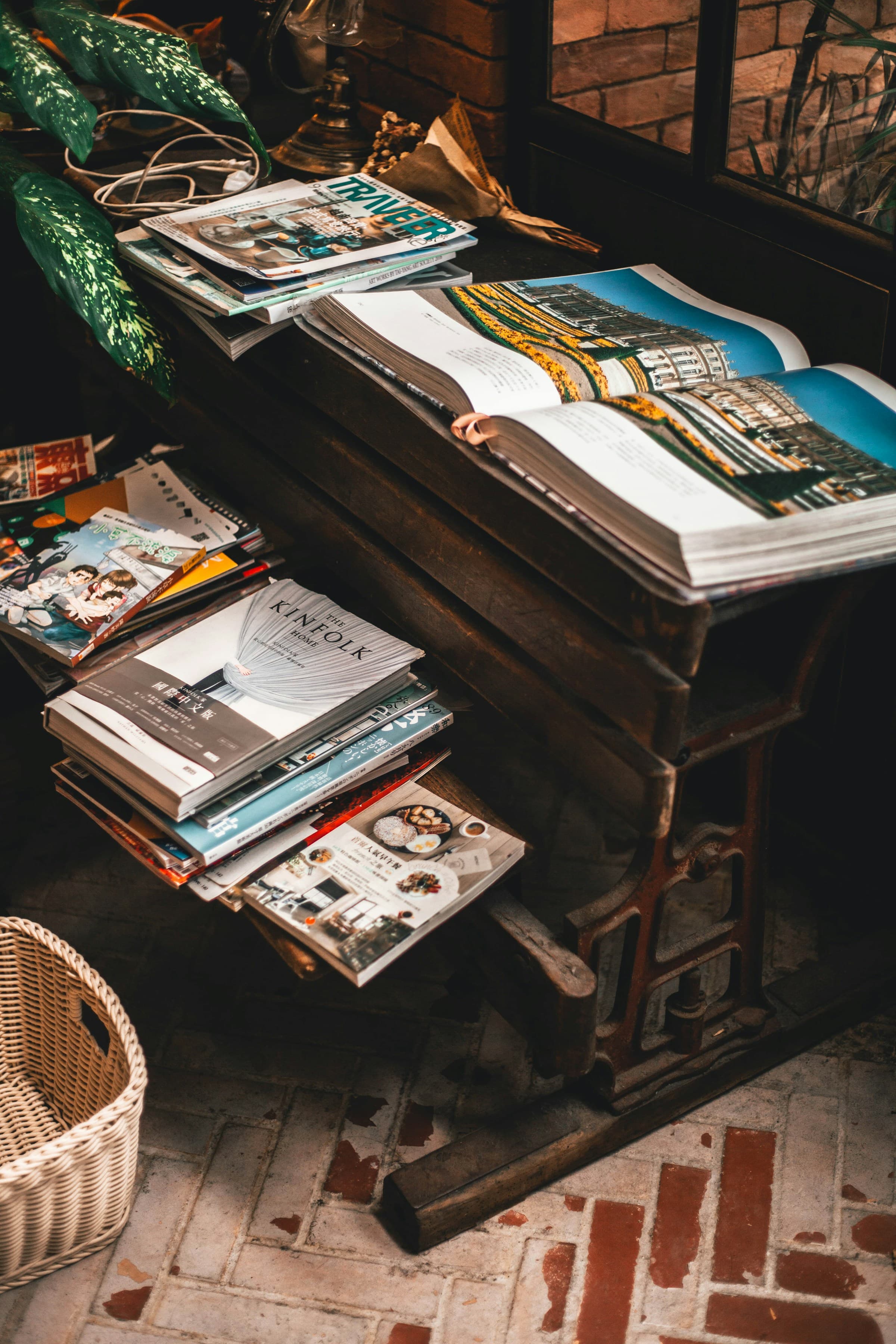 A person browsing a wall of magazines